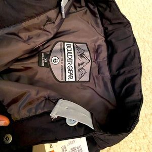 New kids snow pants.  Tags attached.  Never worn. XS size.  Adjustable waist.